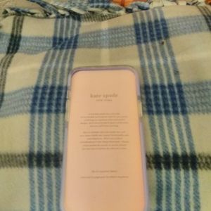 Kate Spade I-phone 12 case. Clear with pink stones on back cover.